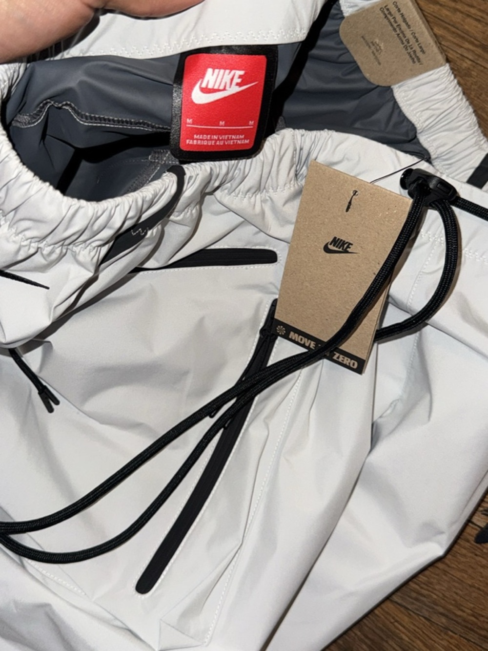 Nike White Athletic Shorts with Black Zipper Accents - Picture 3 of 6